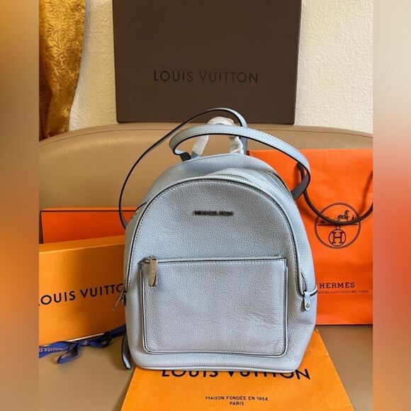MICHAEL KORS
Adina Medium Pebbled Leather Backpack NWT light blue & wristlet